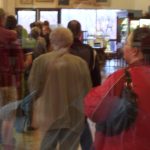 Voters queuing outside a polling station